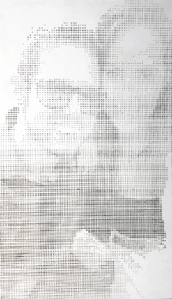 A small milled portrait of a couple in sunglasses