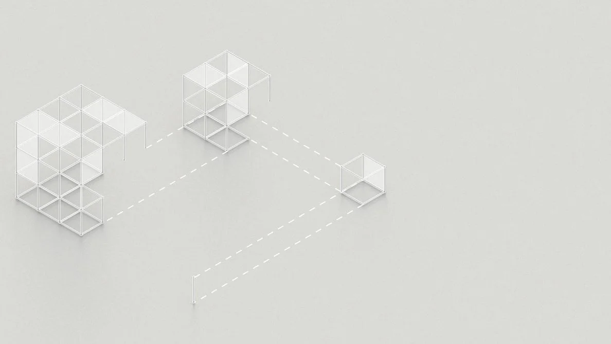 A cube drawn as stacked wireframe boxes on a grey ground
